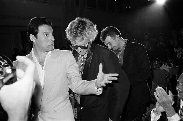 The Ivor Novello Awards. Pictured, Freddie Mercury, Roger Taylor and John Deacon of Queen