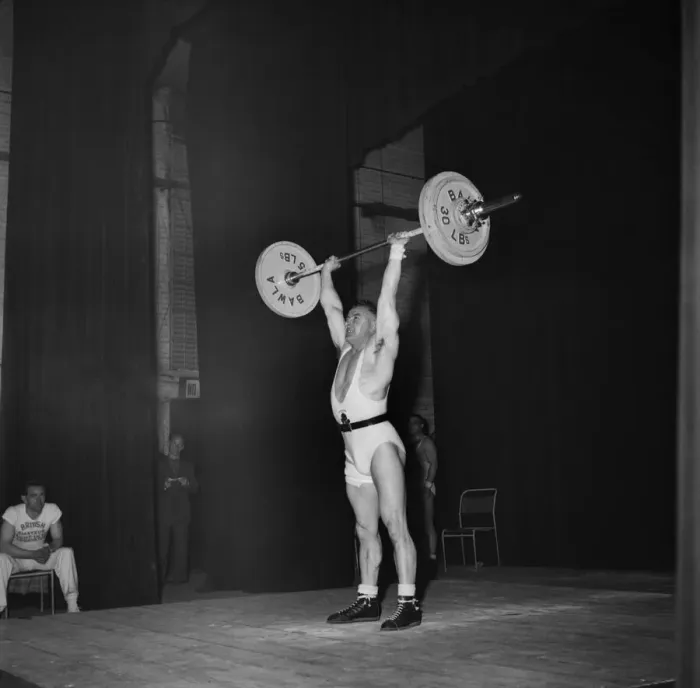 Framed Print : J Halliday. Champion Weight Lifter. O23975