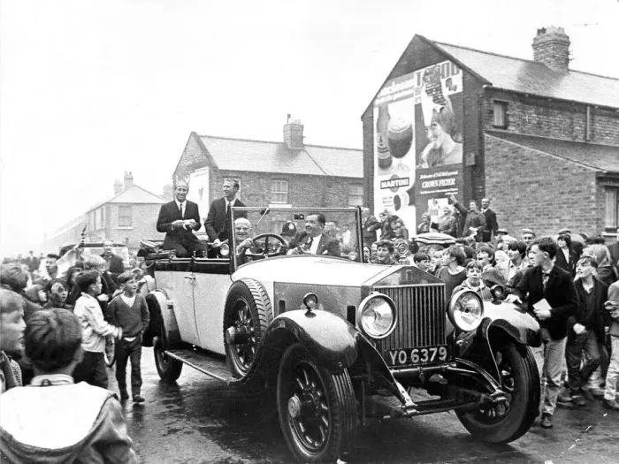 Framed Print : Jack and Bobby Charlton look over-awed as youngsters crowd around the car taking them to Framed Print : Jack and Bobby Charlton look over-awed as youngsters crowd around the car taking them to