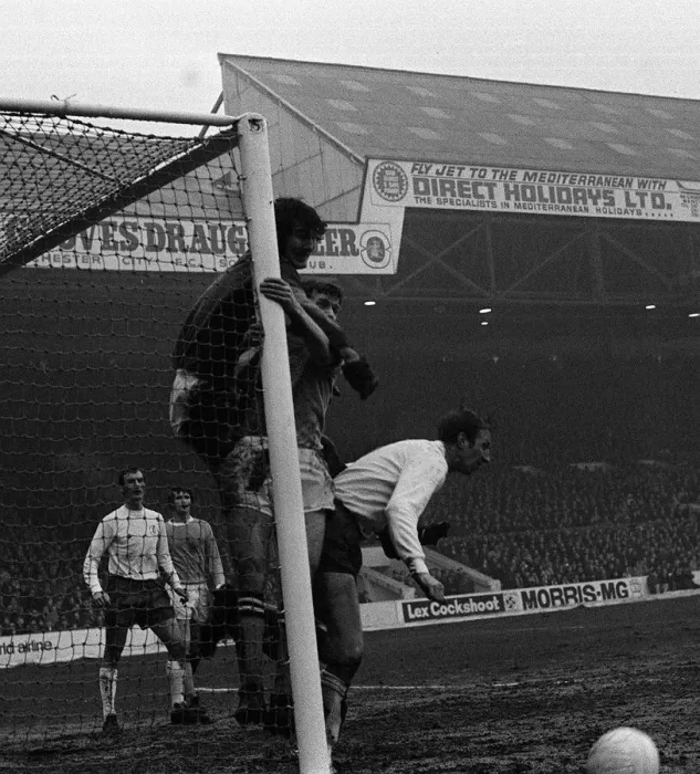 Framed Print : Jack Charlton backs into Man Citys Joe Corrigan during the Manchester City v Leeds