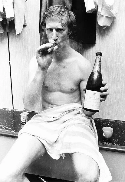 Jack Charlton of Leeds enjoys a cigar and champagne 1971 after winning the European