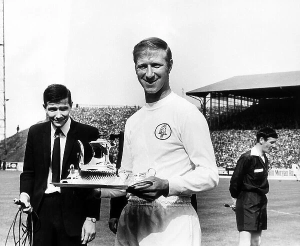 Jack Charlton Leeds United football player receives a silver tea set in recognition for