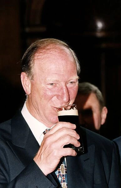 Jack Charlton Manager of the Republic of Ireland Football Team enjoys a glass of Guinness
