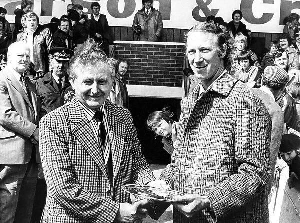 Jack Charlton is presented with a silver salver by the supporters club on his last match