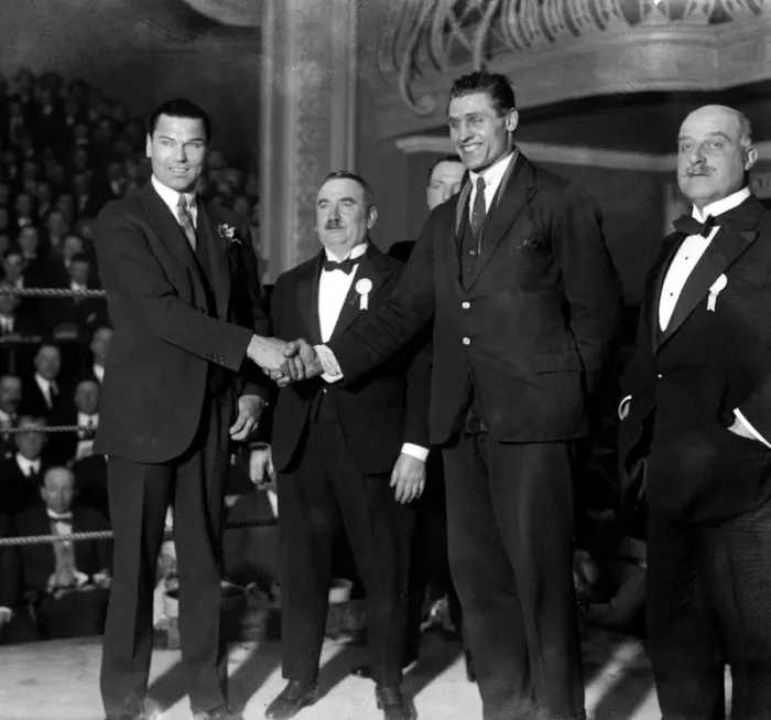 Framed Print : Jack Dempsey at the national Sporting Club shakes hands with Phil Scott