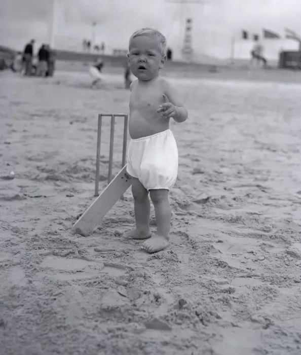 Framed Print : The next Jack Hobbs stands at the crease ready to bat in a game of beach cricket Framed Print : The next Jack Hobbs stands at the crease ready to bat in a game of beach cricket