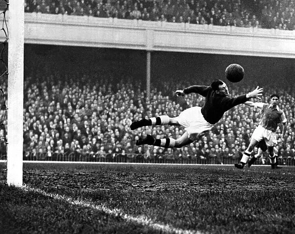 Jack Kelsey (Goalkeeper) Football Player of Arsenal - diving to save a shot during