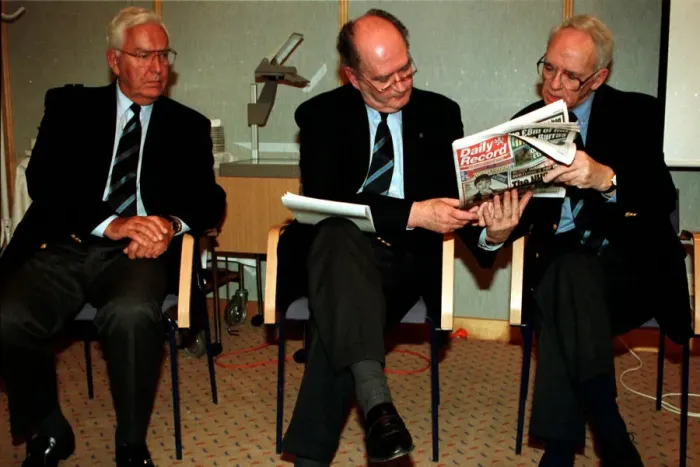 Framed Print : Jack McGinn Celtic football director sitting in chair showing Dazily Record to Bill Framed Print : Jack McGinn Celtic football director sitting in chair showing Dazily Record to Bill