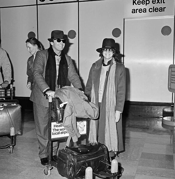 Jack Nicholson and Debra Winger arrive in London. 25th February 1984
