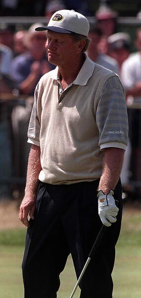 Jack Nicklaus Golfer looks disappointed after missing a putt on the 18th green during