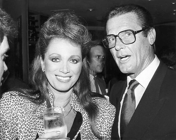 Jackie Collins Author With Actor Roger Moore Dbase