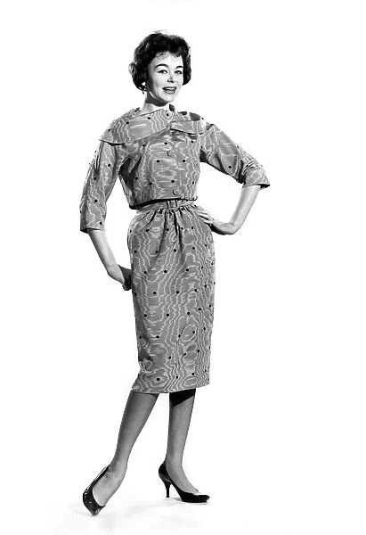 Jackie Jackson wearing a patterned dress with bow. July 1960 P009012