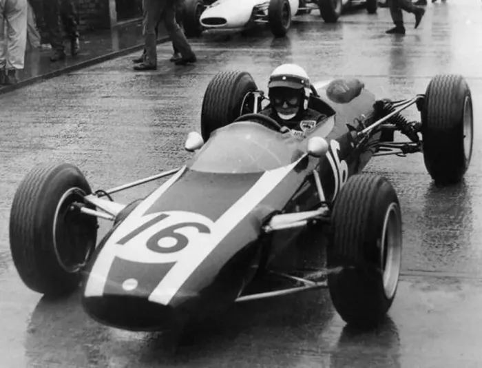 : Jackie Stewart, Cooper B. R. M leaving the pits during a practice race at Silverstone : Jackie Stewart, Cooper B. R. M leaving the pits during a practice race at Silverstone
