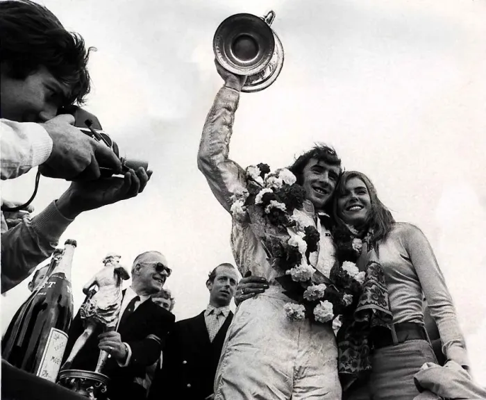 Framed Print : JACKIE STEWART ex World Champion RACING DRIVER WITH WIFE HELEN Stewart AFTER HE WON Framed Print : JACKIE STEWART ex World Champion RACING DRIVER WITH WIFE HELEN Stewart AFTER HE WON