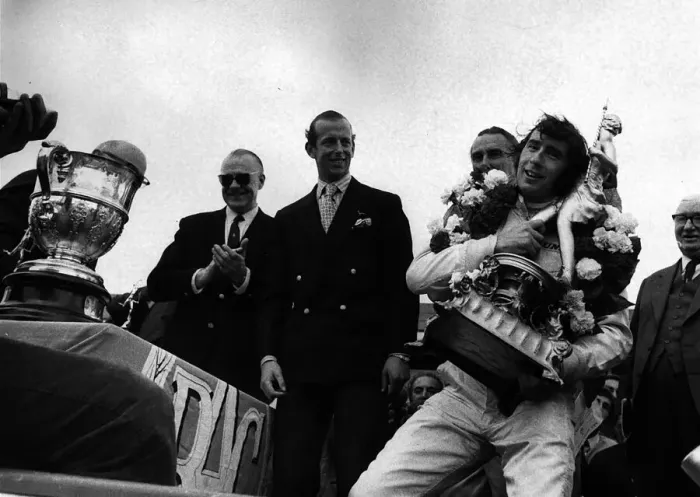 Framed Print : Jackie Stewart after winning British Grand Prix holding trophy Framed Print : Jackie Stewart after winning British Grand Prix holding trophy