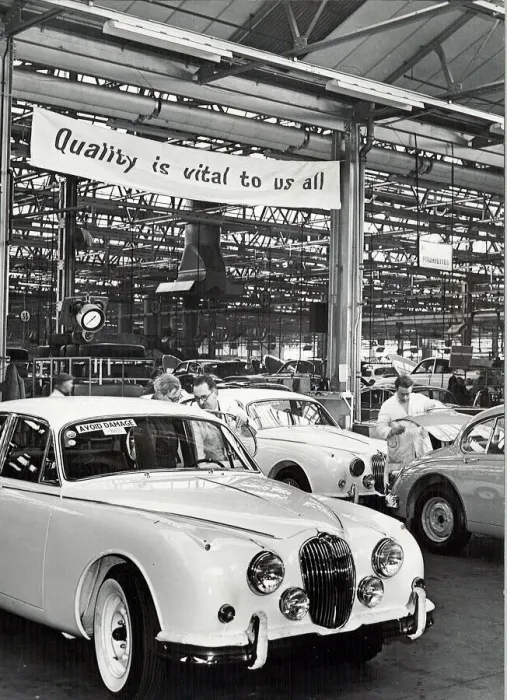 Framed Print : Jaguar Cars factory, Browns Lane, Coventry. The banner above the track reads Framed Print : Jaguar Cars factory, Browns Lane, Coventry. The banner above the track reads