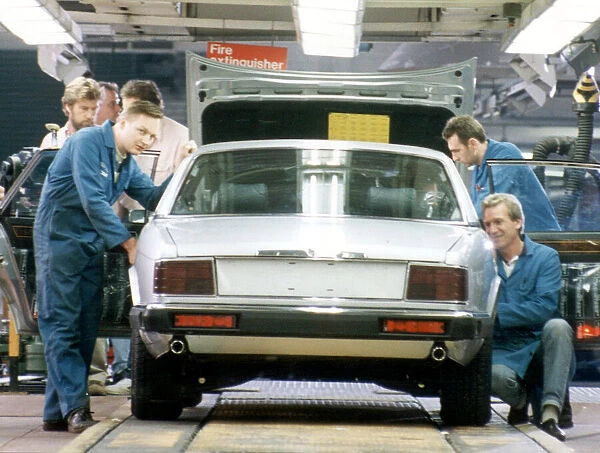 The last Jaguar XJ6 to be built on the old production line reaches the end of the track