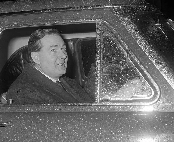 James Callaghan MP February 1963 driving in his car at the House of