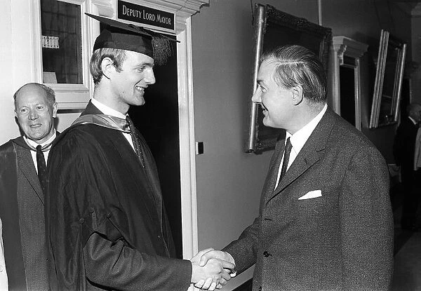 James Callaghan MP shakes hands with his son after he received his degree at Cardiff