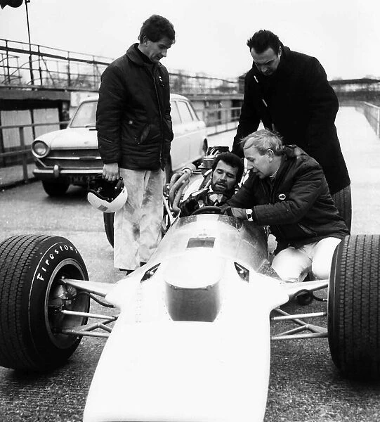 James Garner actor at wheel of racing car 1969