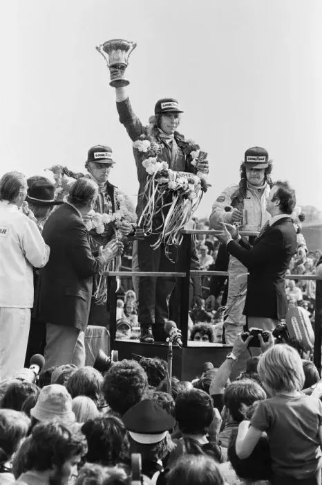 Framed Print : James Hunt on the podium celebrates winning The 1977 British Grand Prix Formula One Framed Print : James Hunt on the podium celebrates winning The 1977 British Grand Prix Formula One