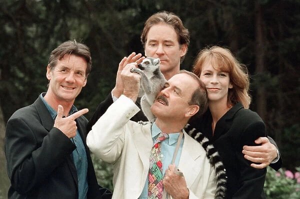 Jamie Lee Curtis, John Cleese (centre with white jacket)
