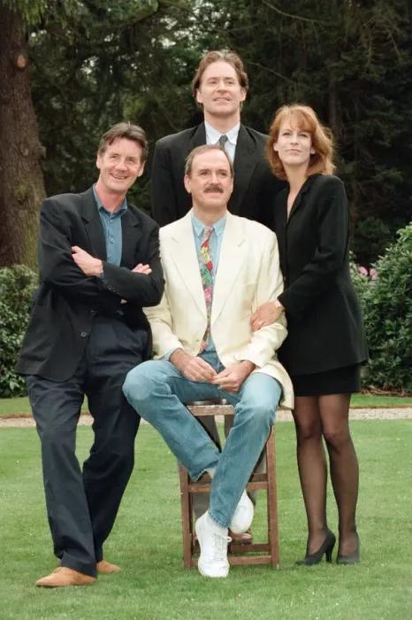 Framed Print : Jamie Lee Curtis, John Cleese (centre in the white jacket and jeans) Framed Print : Jamie Lee Curtis, John Cleese (centre in the white jacket and jeans)