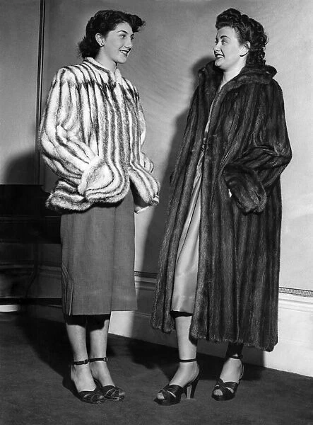 Jane Farrell (right) in a labrador mink coat with full ripple back