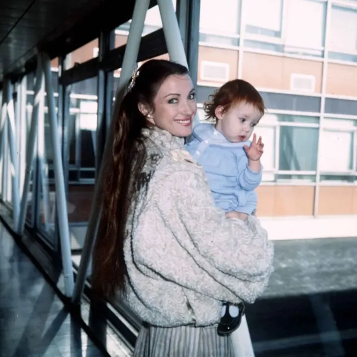 Framed Print : Jane Seymour Actress with daughter Katy at London Airport February 1983