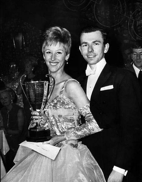 Janet Wade and her husband Richard Gleave hold the Daily Record Silver Challenge Trophy