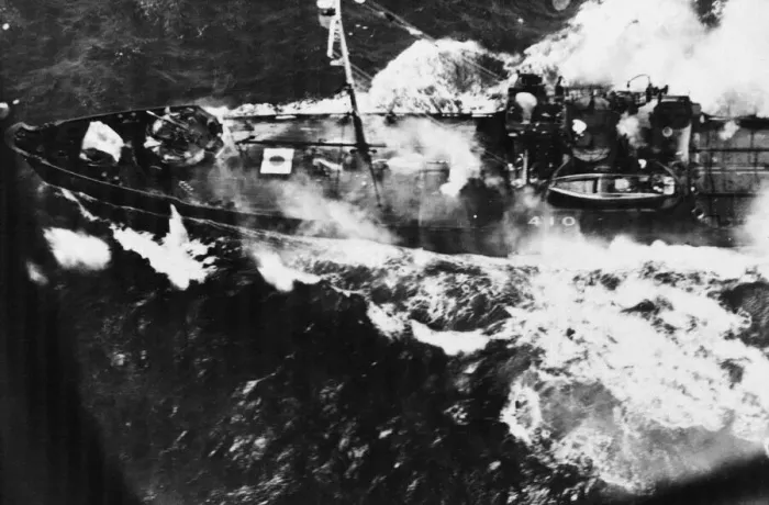Framed Print : A Japanese cargo ship attacked by a US B-24 Liberator bomber Framed Print : A Japanese cargo ship attacked by a US B-24 Liberator bomber