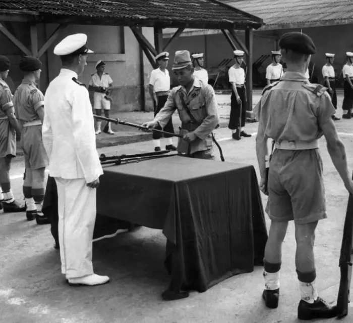 Framed Print : Japanese Navy surrender their weapons. Saigon is handed over to the British Navy Framed Print : Japanese Navy surrender their weapons. Saigon is handed over to the British Navy