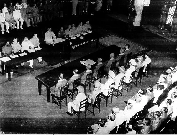 Japanese about to sign surrender documents Sept 1945 in the Conference Room