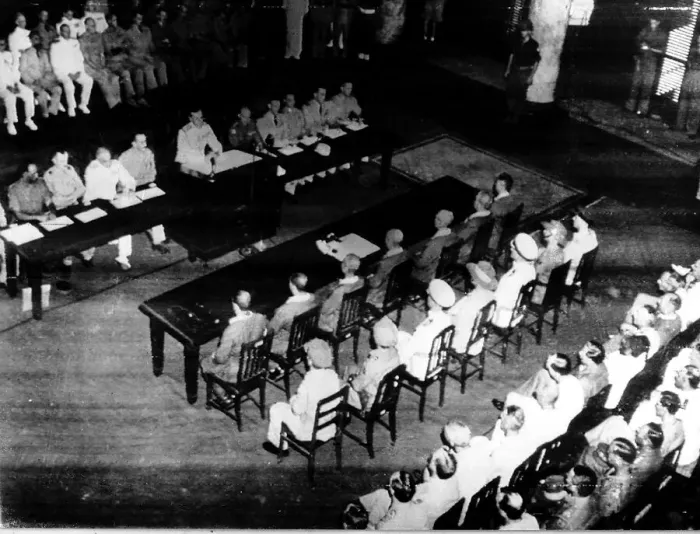 Framed Print : Japanese about to sign surrender documents Sept 1945 in the Conference Room