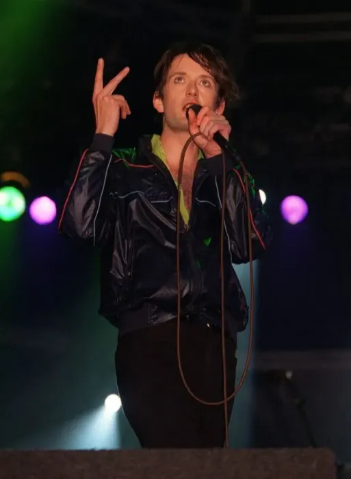 Framed Print : Jarvis Cocker on stage at T In The Park July 1996 Swearing at the audience Framed Print : Jarvis Cocker on stage at T In The Park July 1996 Swearing at the audience