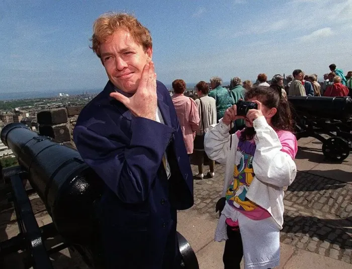 Framed Print : Jason Donovan being photographed by fan at Edinburgh castle Framed Print : Jason Donovan being photographed by fan at Edinburgh castle