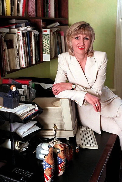 Jayne Irving TV Presenter July 1998 At home sitting on her desk A©mirrorpix