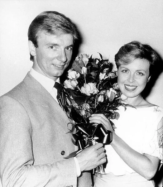 Jayne Torvill and Christopher Dean at the Chelsea flower show with bouquet of Bees of