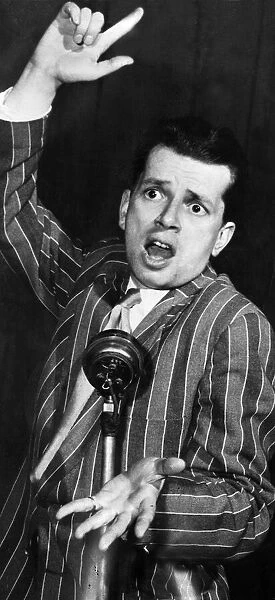Jazz musician George Melly performing on stage, circa 1969