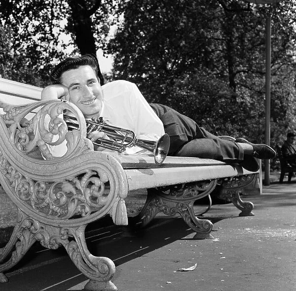 Jazz trumpeter Kenny Ball pictured in Londons Embankment gardens during rehearsals