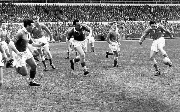 JBG Thomas Collection - Wales v France, Cardiff 1956. Cliff Morgan kicking the ball