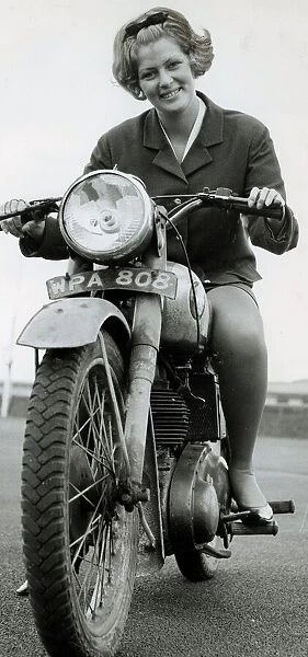 Jean Bruinsma travels to work every day on motorbike September 1967