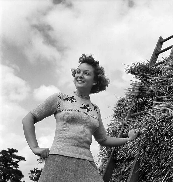 Jean Kert wearing a Special Jumper on her farm in Sussex. August 1953 O20002-005