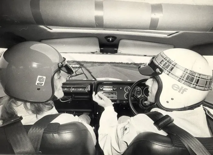 Framed Print : Jean Rook Daily Express reporter with Jackie Stewart at Silverstone race circuit hanger