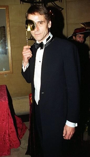 Jeremy Irons actor with face mask March 1998 Jeremy Irons arrives at the party for
