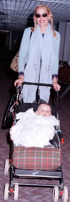 Framed Print : Jerry Hall and baby arrive at London Airport from New York and their Christmas holiday