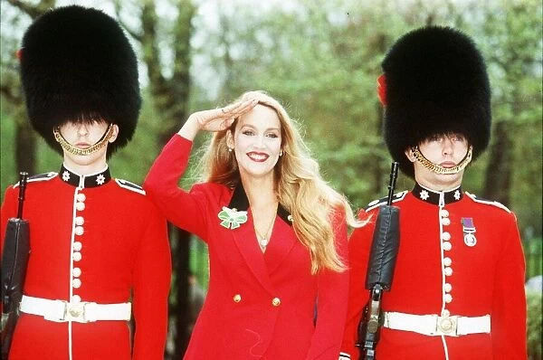Jerry Hall Model with two Buckingham Palace guards to launch a charity appeal