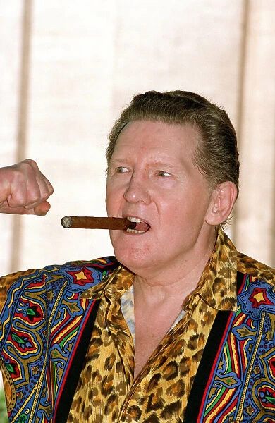 JERRY LEE LEWIS IN COLOURFUL SHIRT SMOKING A CIGAR 30  /  06  /  1993