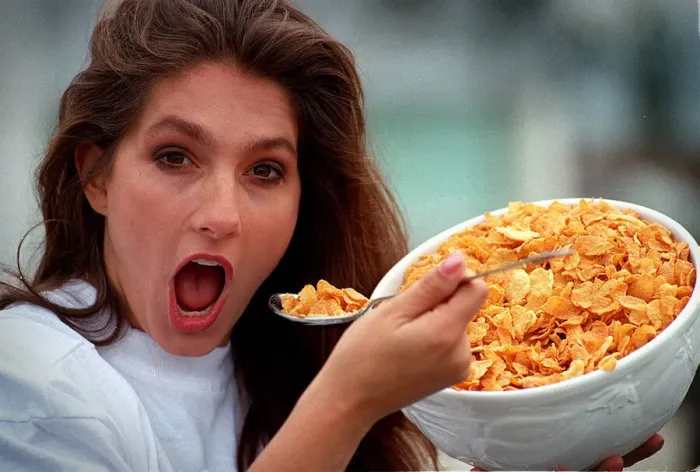 Framed Print : Jet from the tv programme Gladiators eating a bowl of cornflakes with a spoon Framed Print : Jet from the tv programme Gladiators eating a bowl of cornflakes with a spoon