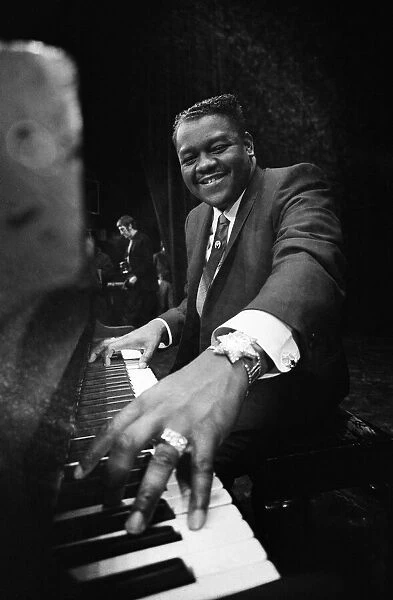 Jewellery studded Fats Domino at the Saville Theatre, weighed down with 59